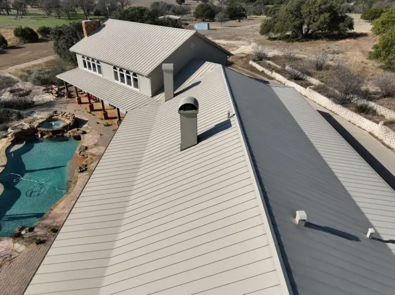 Chimney flashing replacement on standing seam metal roof – East Texas