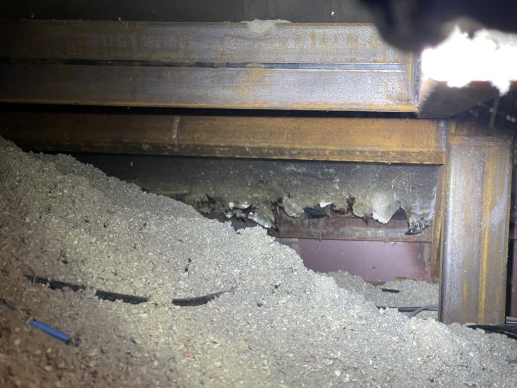 Chimney flashing replacement on standing seam metal roof – East Texas
