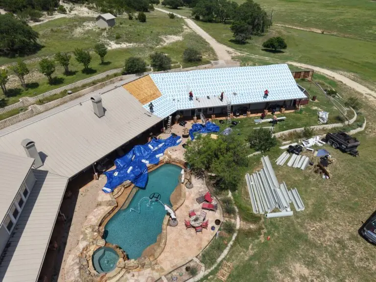 Chimney flashing replacement on standing seam metal roof – East Texas