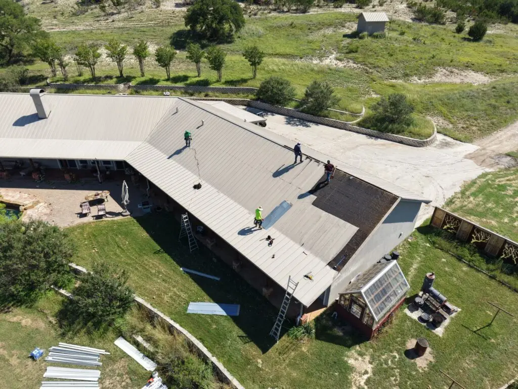 Chimney flashing replacement on standing seam metal roof – East Texas