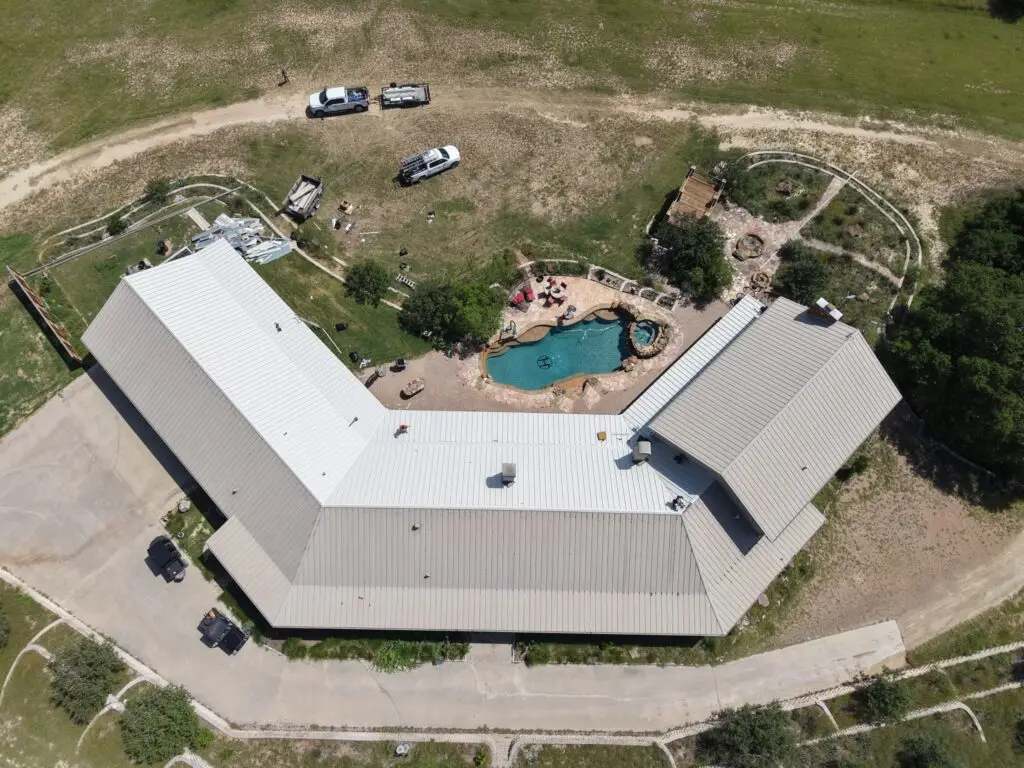 Chimney flashing replacement on standing seam metal roof – East Texas