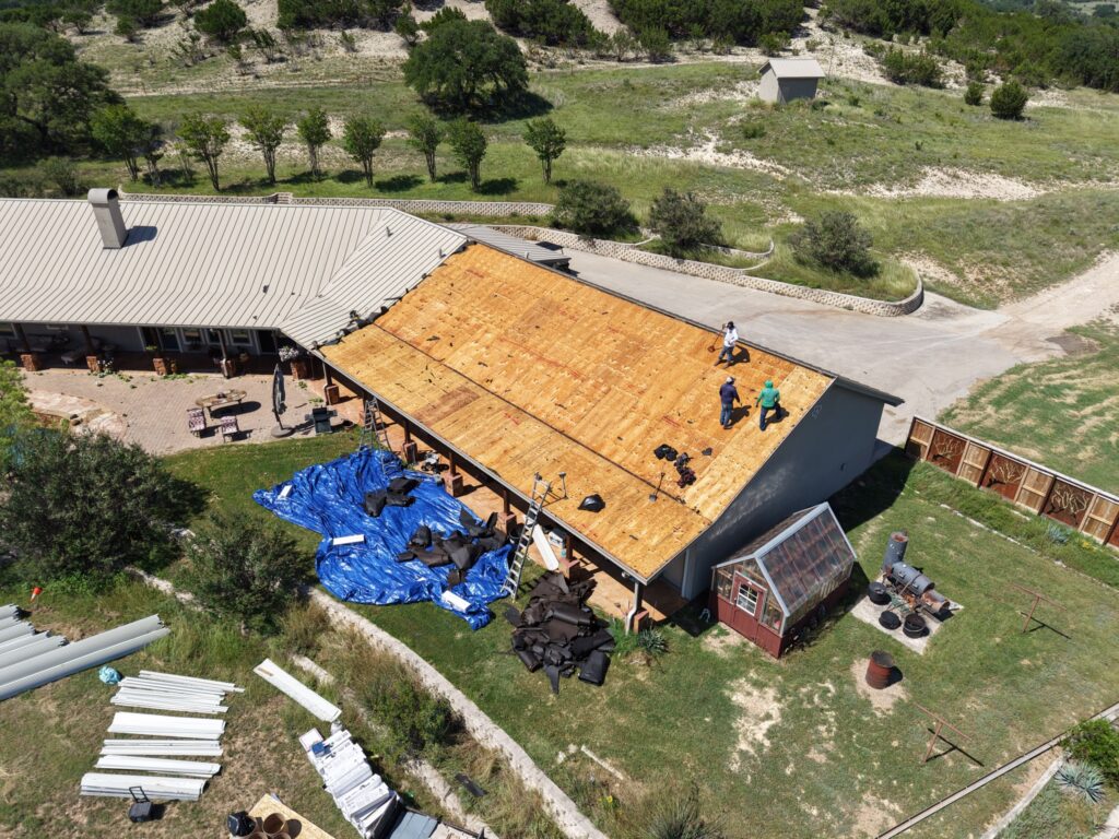 Chimney flashing replacement on standing seam metal roof – East Texas