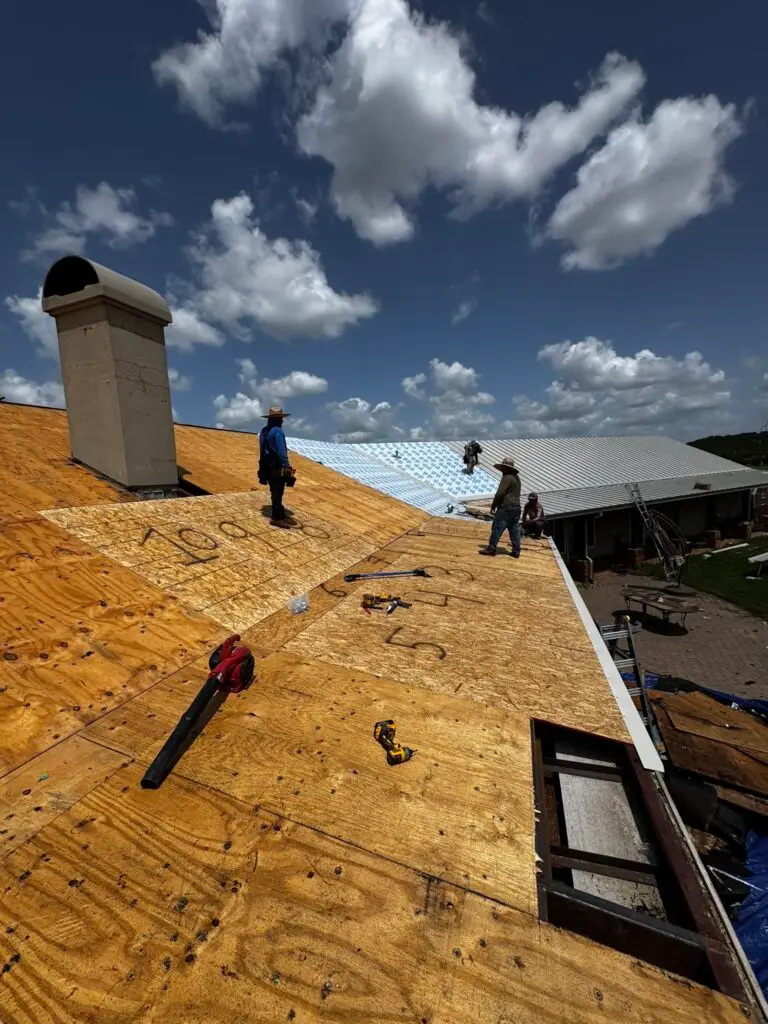Chimney flashing replacement on standing seam metal roof – East Texas