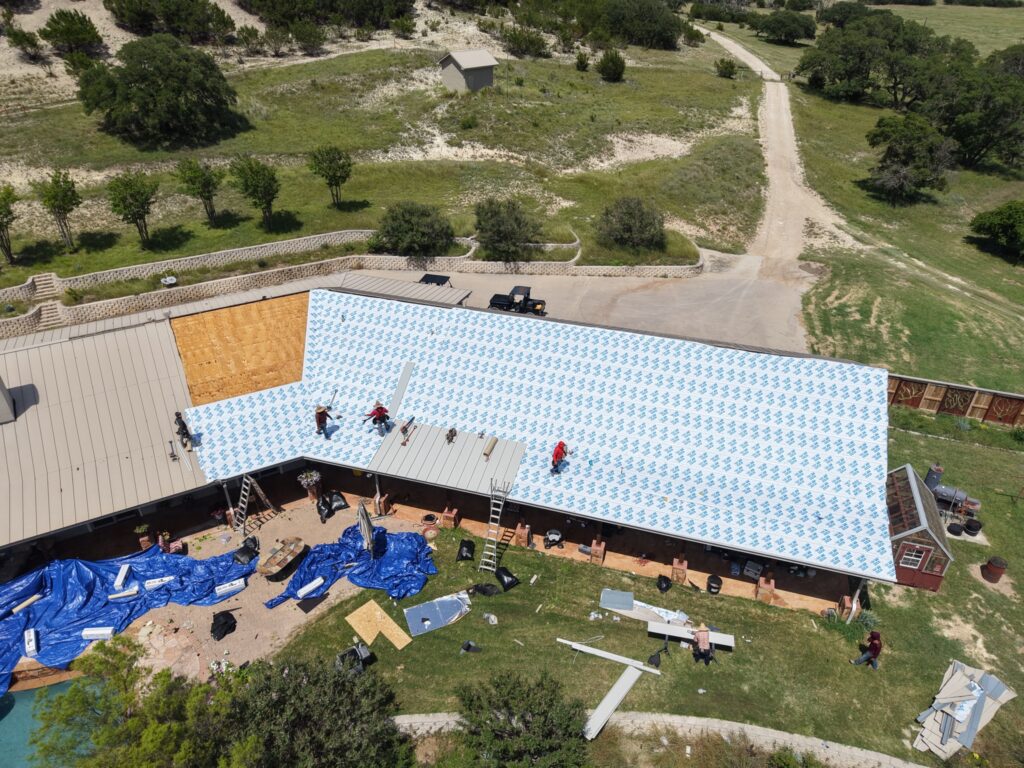 Chimney flashing replacement on standing seam metal roof – East Texas