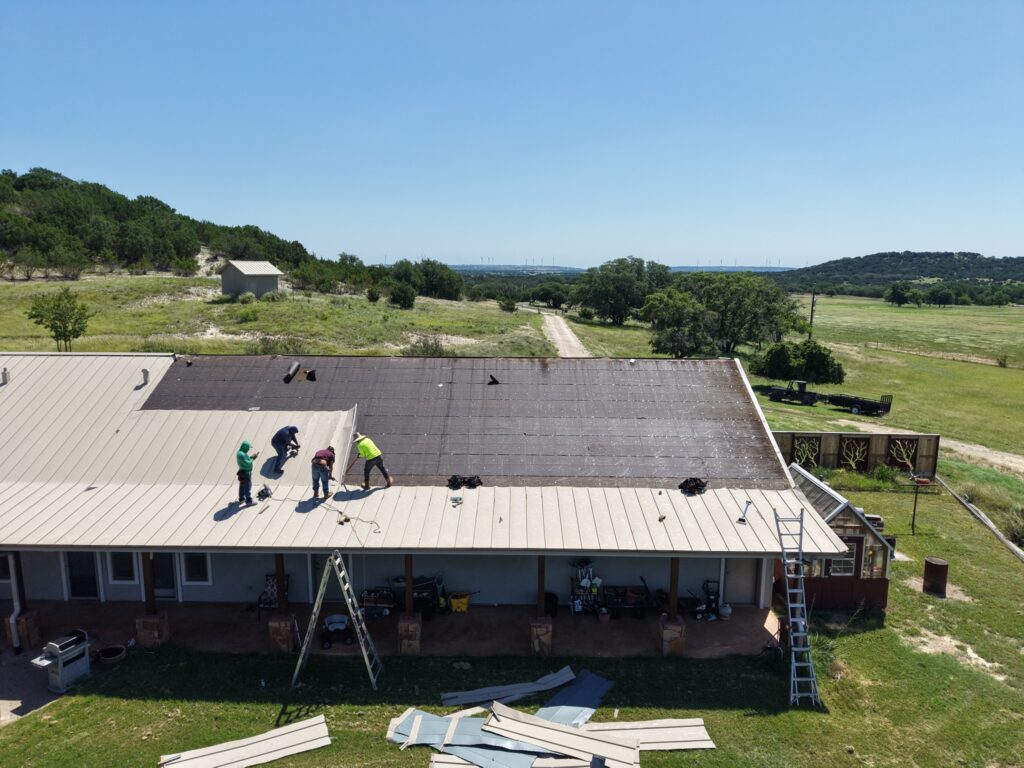 Chimney flashing replacement on standing seam metal roof – East Texas
