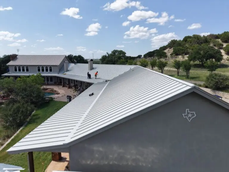Chimney flashing replacement on standing seam metal roof – East Texas