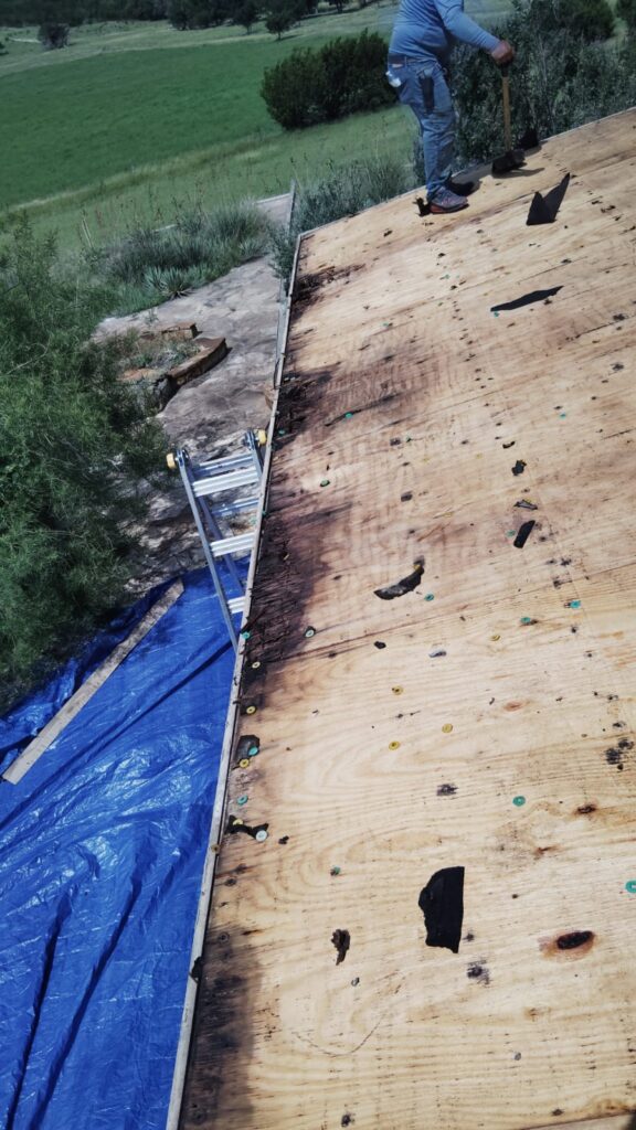Chimney flashing replacement on standing seam metal roof – East Texas