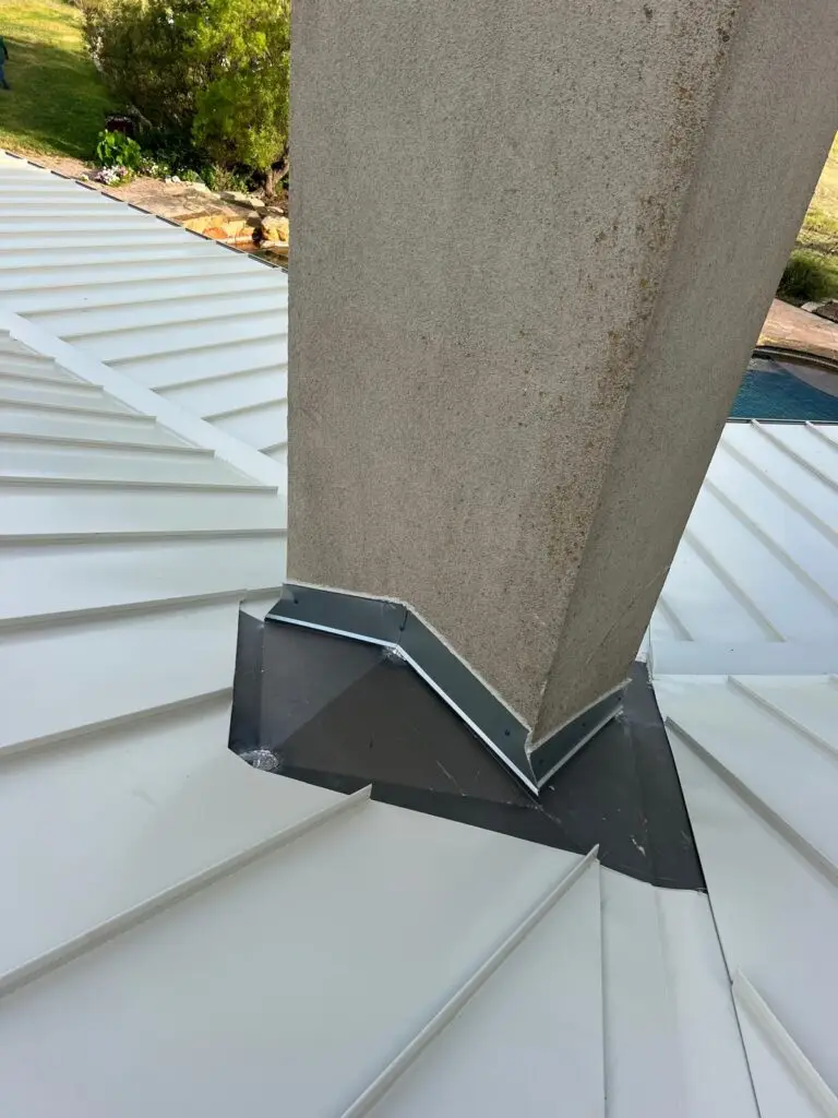 Chimney flashing replacement on standing seam metal roof – East Texas