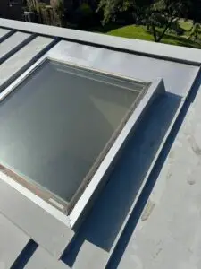 Skylight re-aligned on loosen metal roof repair