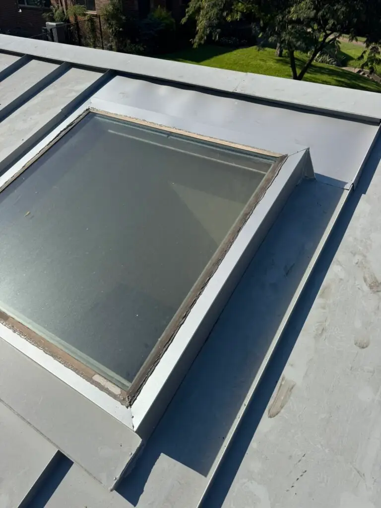 Skylight re-aligned on loosen metal roof repair
