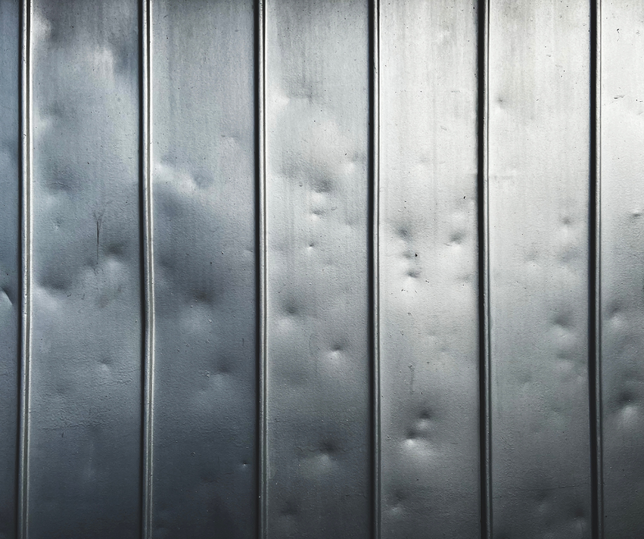 Hail damage metal roof restoration DFW panel replacement process